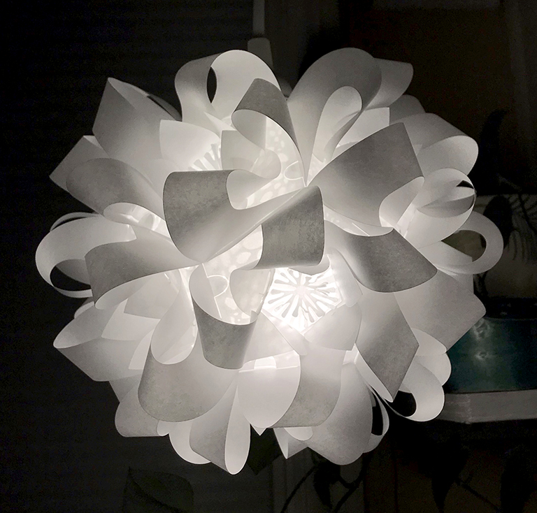 This beautiful example of an elaboration employs complex additional layers and perforations to give a floral effect. Notice the variations in light level that surround the stamen, and then the spotted projections in other deep areas of the lamp. elaboration-example