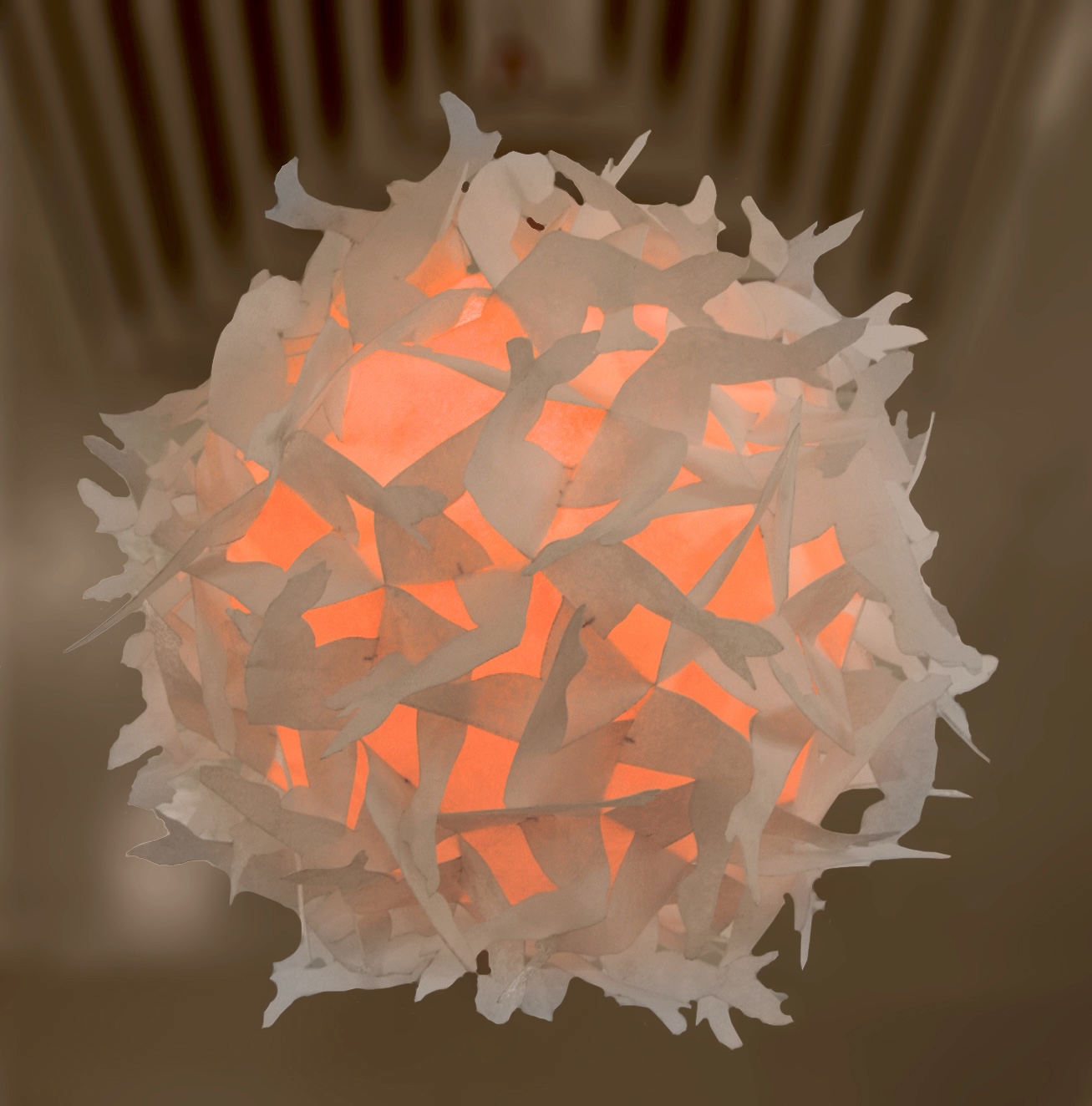 The frosty effect occurs when ambient light in the room illuminates the extensions while the inner surfaces illuminated from within by a different colored bulb. frosty