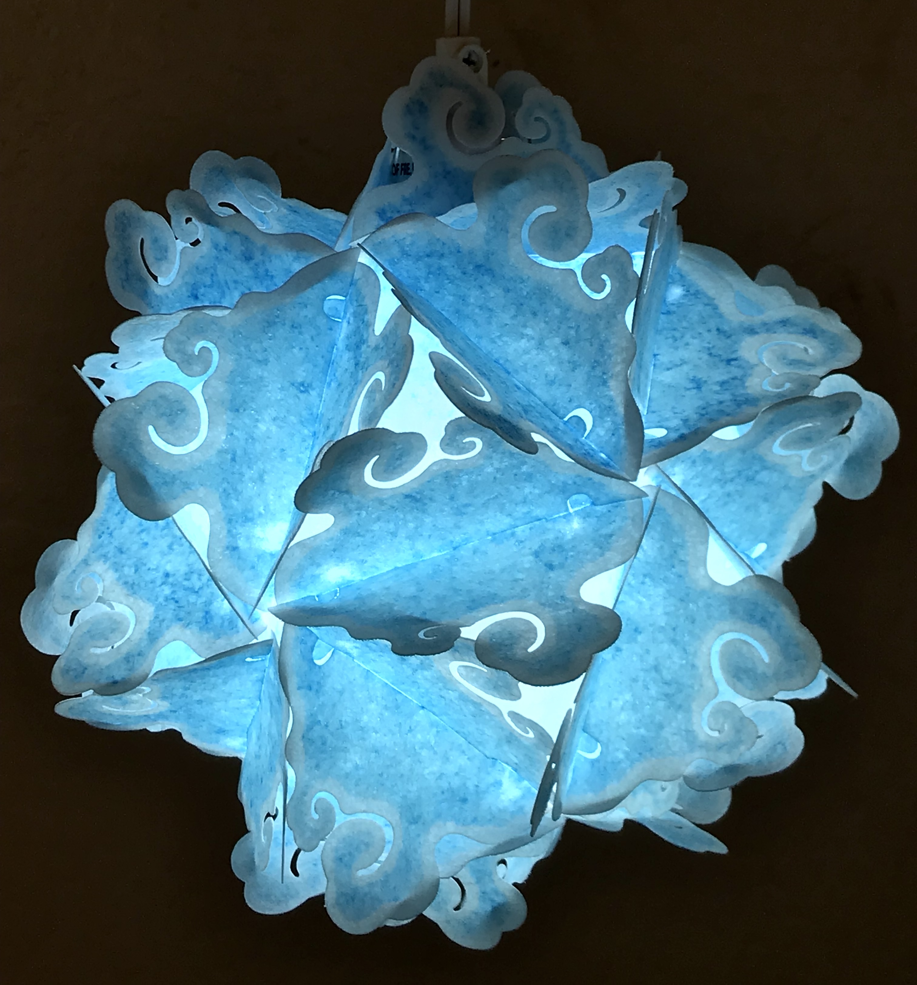 Blue paint was applied to the lamp material directly, affecting the color. blue-paint