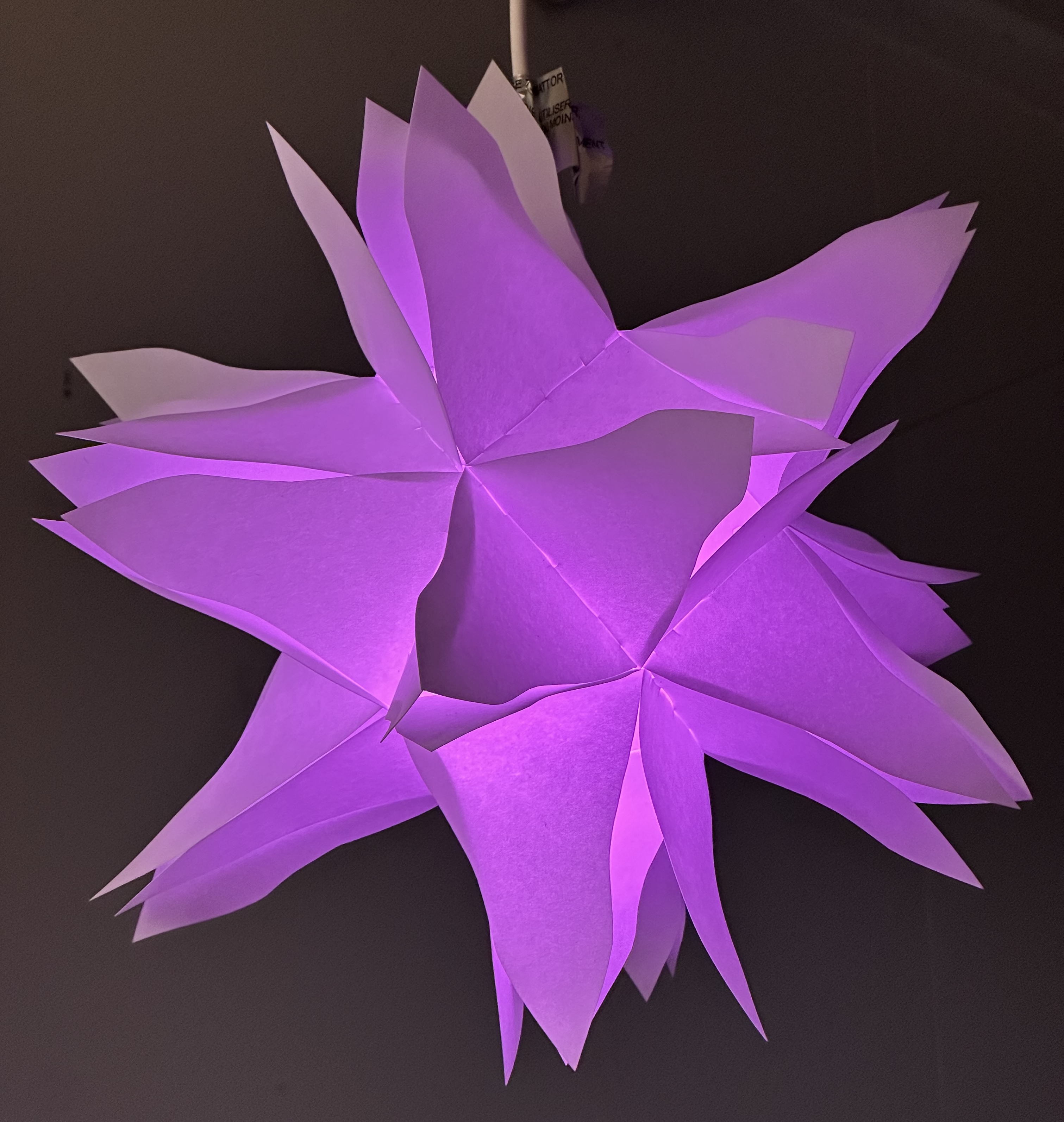 This light has a remote that lets you play with color. changing-purple