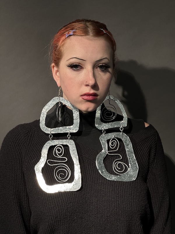 A visually striking set of earrings by Grace Moore, Fall 2023. grace-moore