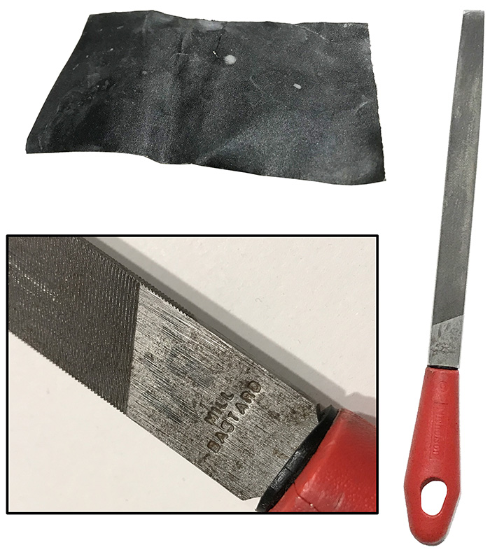 Sand paper and a mill-cut bastard file. sandpaper-and-files