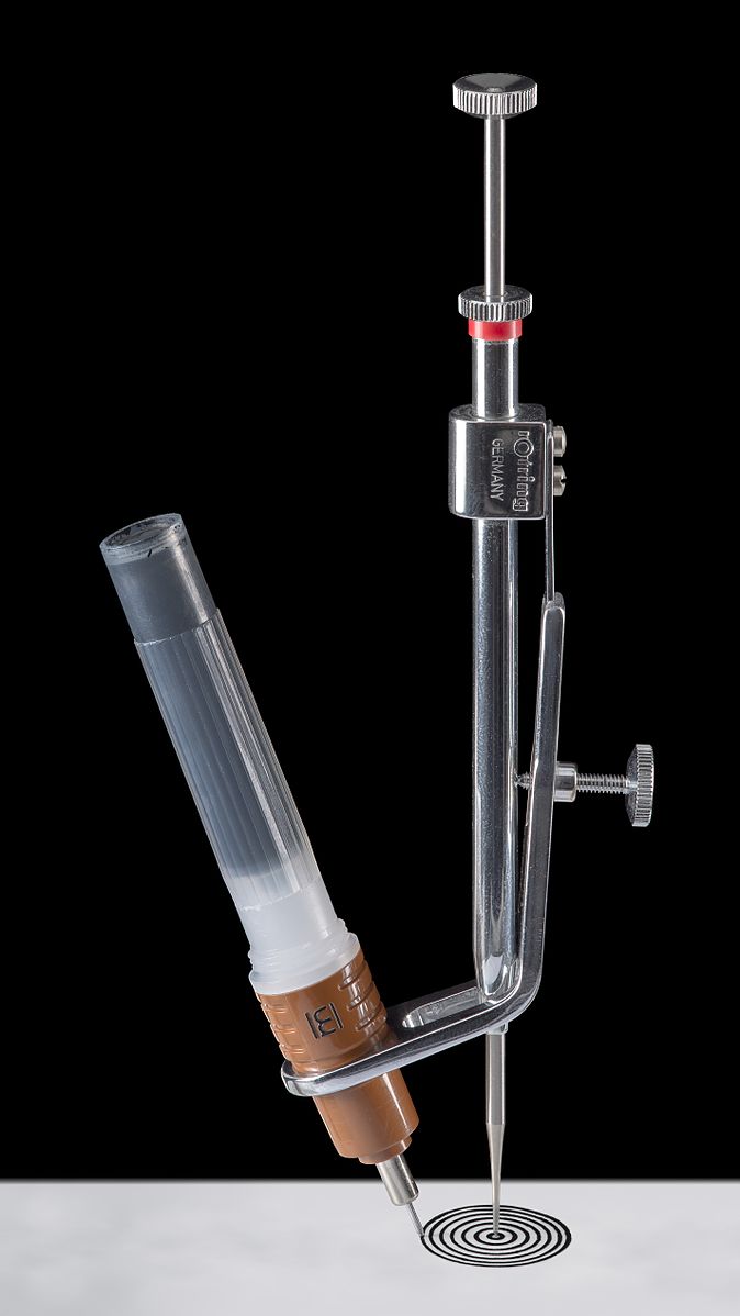 A beautiful drop-bow compass, used for making extremely fine and small circles. rotring