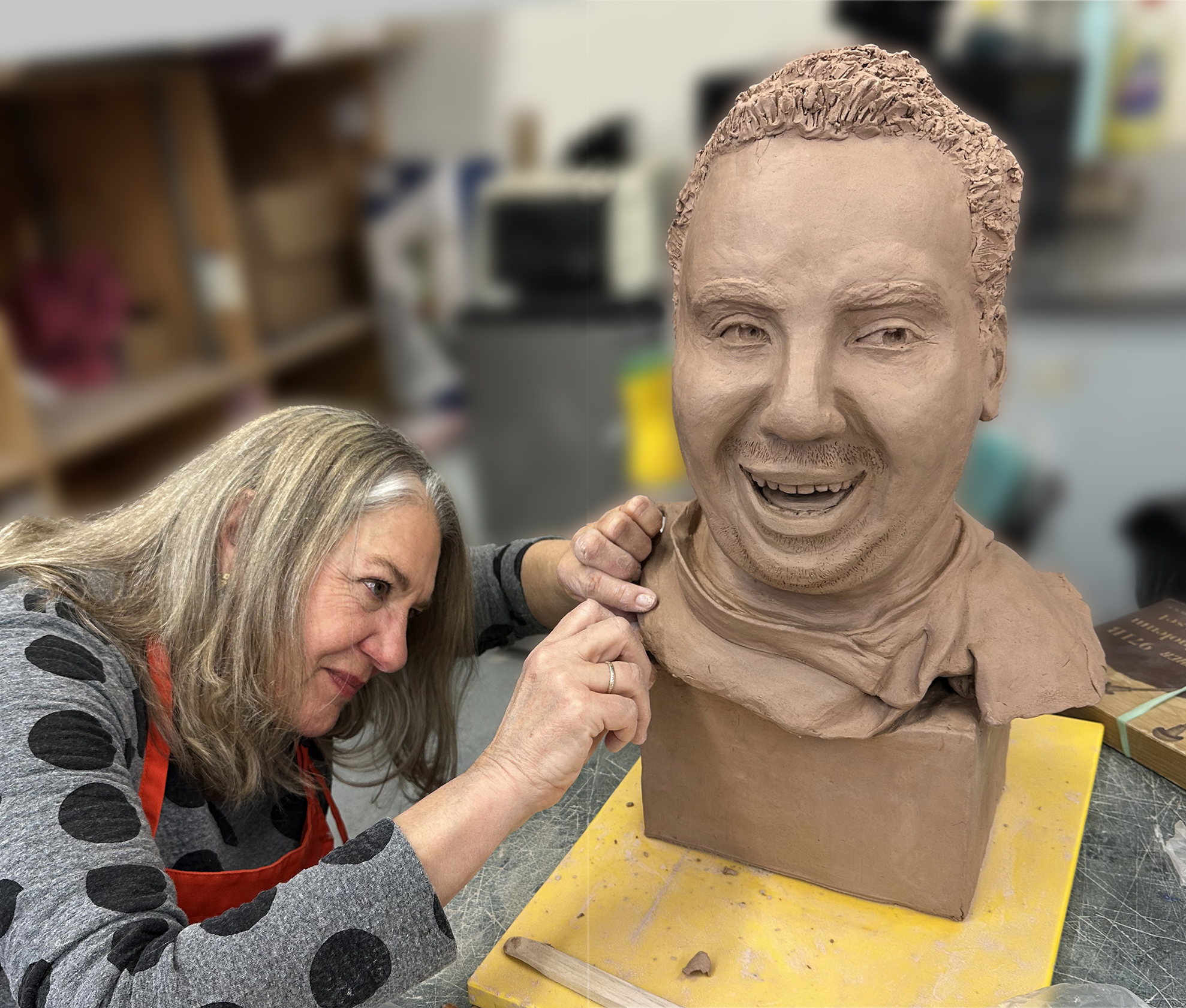 Holly Hodnick making a larger-than-life bust of her son, Spring 2025. bust-8